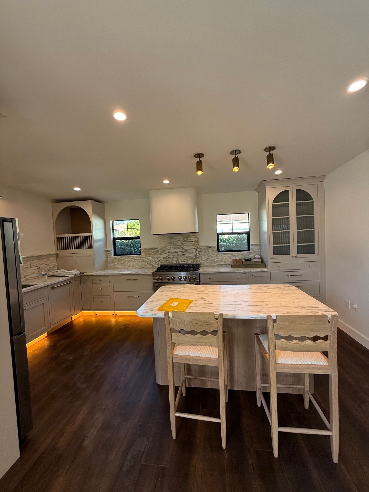 Recessed lighting installation in modern home