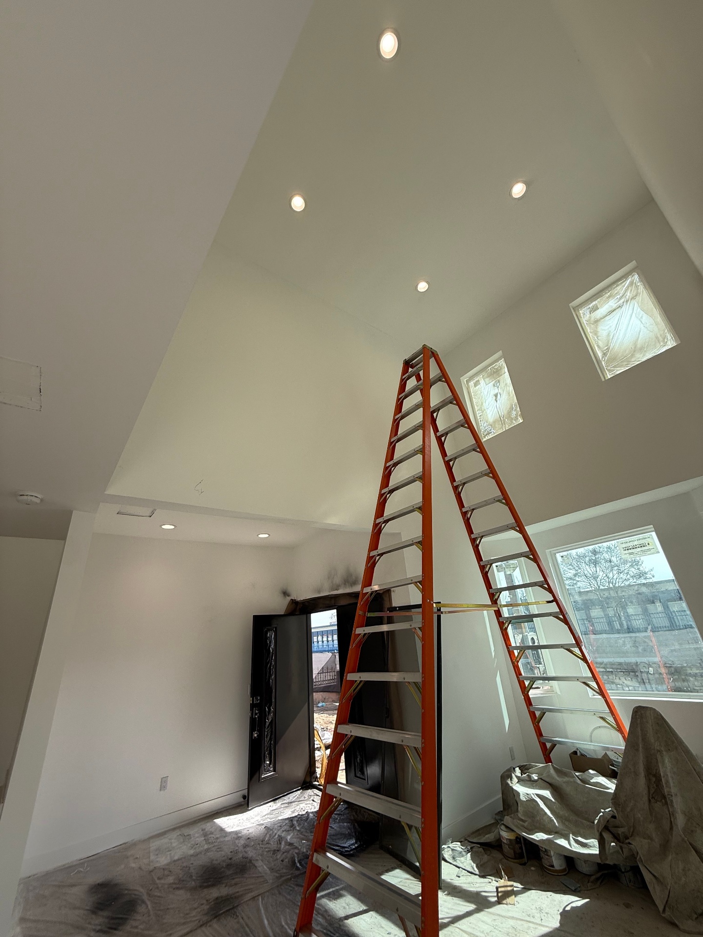 High ceiling recessed lighting by Reld Electric